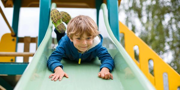 Little boy sliding