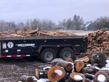 split and seasoned firewood, stacked and delivered