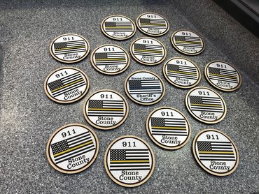 wood and acrylic coasters of US flag with blue or yellow stripe reading "springfield police" or "911
