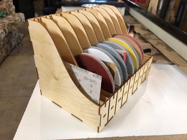 Wood sandpaper organizer.