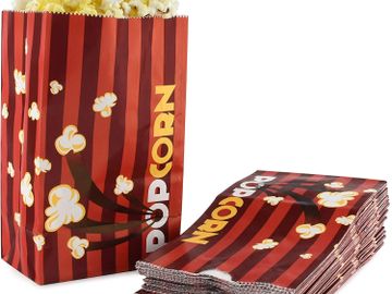 Red popcorn bags that hold 32 ounces of popped popcorn.