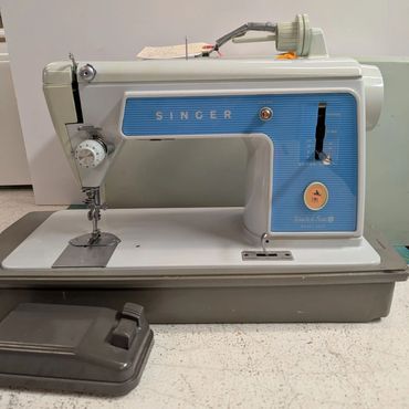 Beautiful Blue Vintage Singer Touch and Sew 604e straight stitch sewing machine