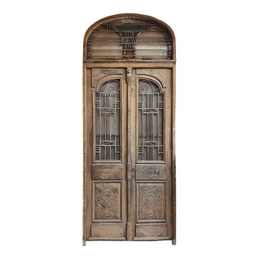 1920s Art Deco Carved Wood and Wrought Iron Entry Doors
DIMENSIONS:58.5ʺW × 4ʺD × 145.5ʺH
Door dimen