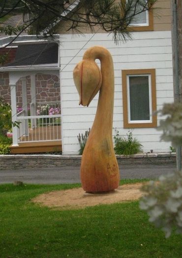 Anick Boulet Sculpture bois québécois organique nature métal sculpteur meilleur scie éruption fleur