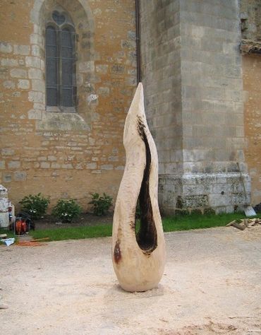 Anick Boulet Sculpture bois québécois organique nature métal sculpteur meilleur scie éruption