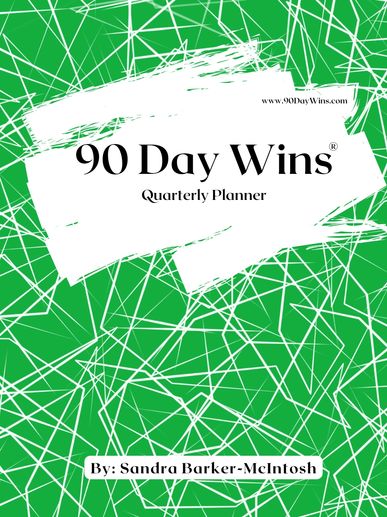 Bright green cover with 90 Day Wins Quarterly Planner in black writing. 