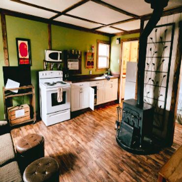 A cozy, functional kitchen with a woodstove!
