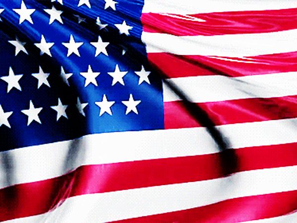Waving American flag with vibrant stars and stripes.