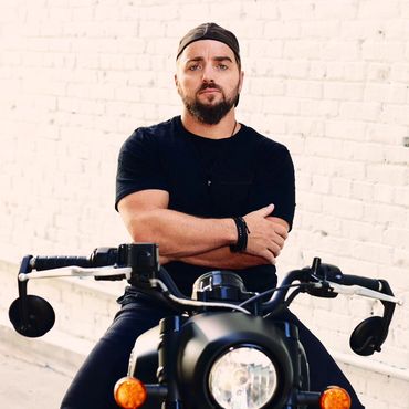 Chris Grant Wenchell - Motorcycle Portrait on Indian Scout Bobber - Actor Lifestyle Brand Shot