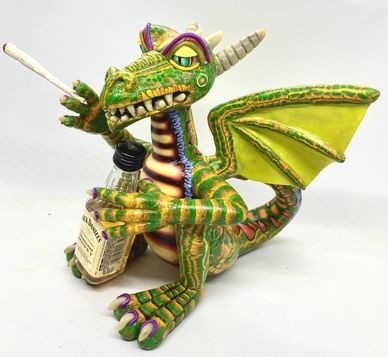 Polymer clay dragon smoking a joint holding a bottle of Jack Daniels by James Lloyd Jenkins