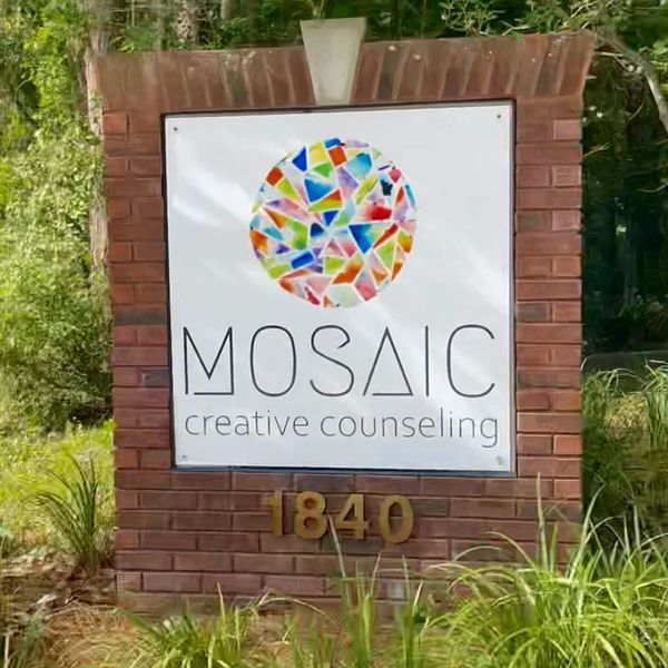 Mosaic Creative Counseling Logo and outdoor sign in Tallahassee Florida. 1840 fiddler court