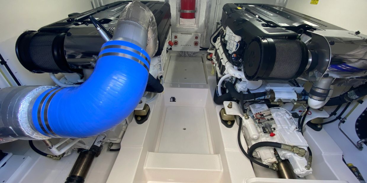 Twin Volvo Penta D13 900 in a clean mechanical room.