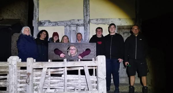 One unlucky participant in the stocks on the Taunton Ghost Walk