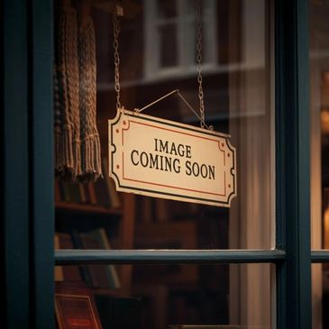 sign hanging on door that says image coming soon.