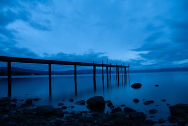 A Lake Tahoe sunrise and pier silhouette that takes you to a place of childhood imagination.
