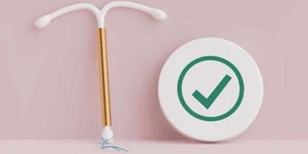 Copper IUD with a checkmark symbol.