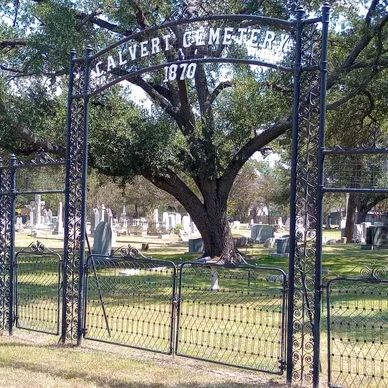 Picture of the gated entrance to the historic Calvert Cemetery.