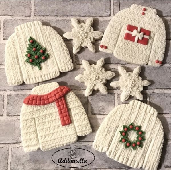 Custom decorated winter sweater cookies