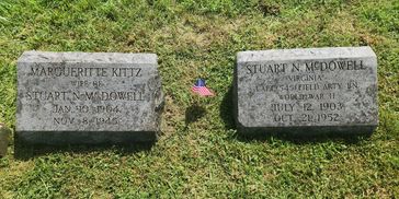 Thes cleaned grave of a WW2 veteran and his wife.