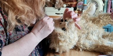 This is me, Vivienne McBride, making one of my handmade mohair bears.