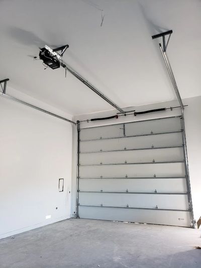 Insulated RV garage door and commercial garage door opener