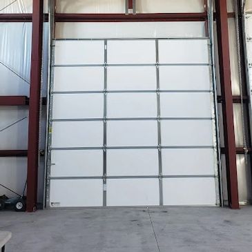 Insulated Garage Door,  Hi-Lift track systems. 