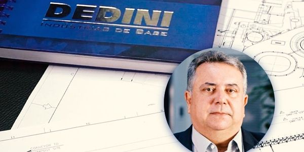 Portrait of a man with Dedini industrial blueprints in the background.