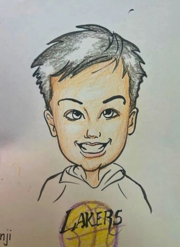 Caricature drawing of a little brunette boy with the Lakers ball sketched at the bottom.