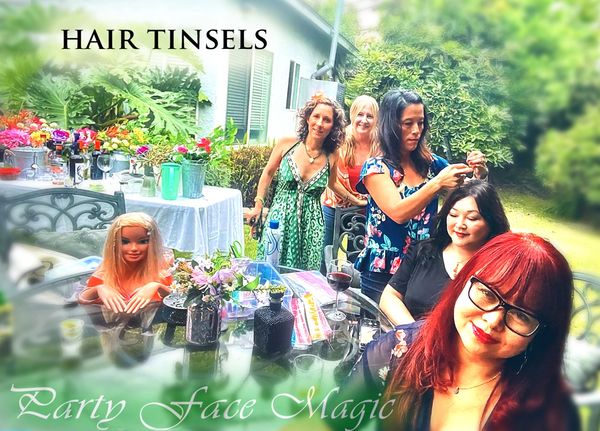 Party Face Magic providing hair tinsels to adult guests in a garden setting.