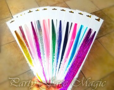 Hair tinsels fanned out to display color options.