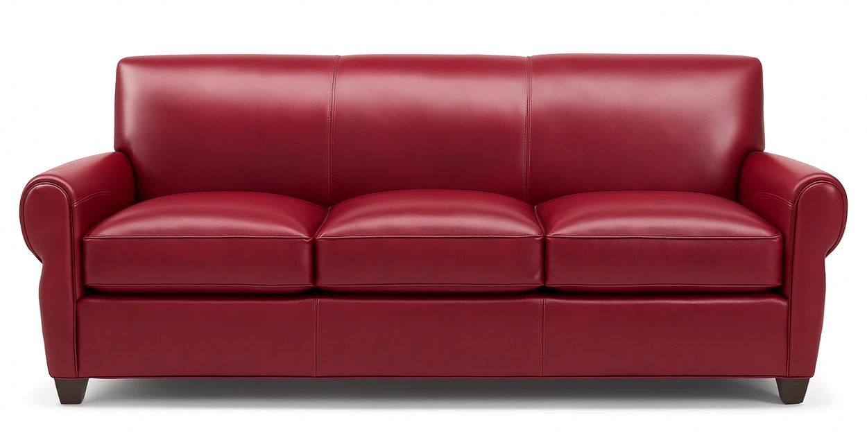 Elegant red leather sofa with cushioned seats and rounded armrests.
