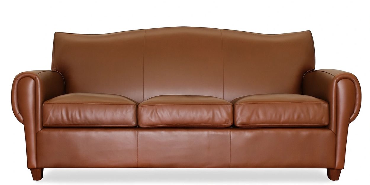 Brown leather sofa with three cushions and rounded armrests.