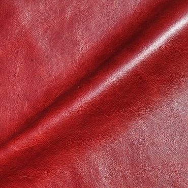 Close-up of textured red leather fabric.