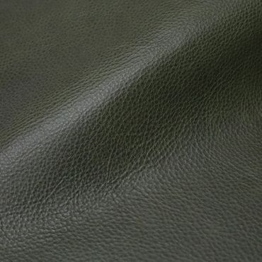 Close-up of textured dark green leather material.