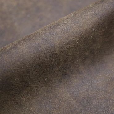 Close-up of textured brown leather material.