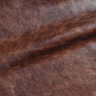 Close-up of textured brown leather surface.