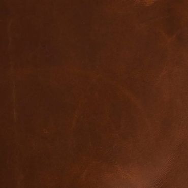 Close-up of a textured brown leather surface.