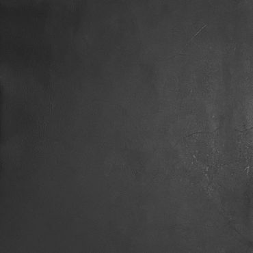 Black textured surface with subtle variations in shading.