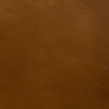 Close-up of a textured brown leather surface.