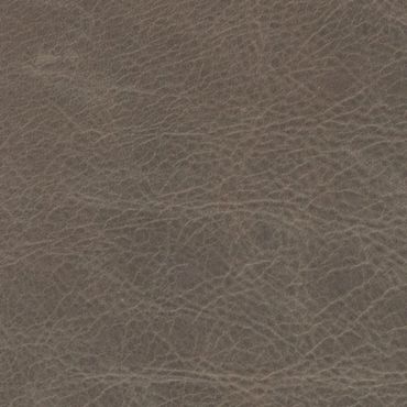 Close-up of textured brown leather surface.