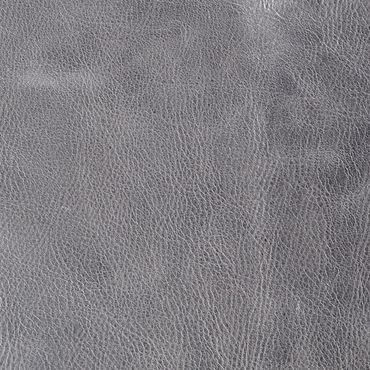 Close-up of textured gray leather surface.