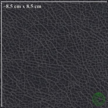 Close-up of black leather texture showing natural grain and wrinkles.