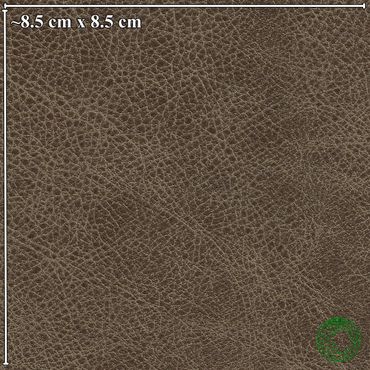 Close-up of textured brown leather surface with measurement scale.
