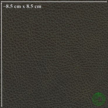 Close-up of a dark textured leather surface with an 8.5 cm scale.