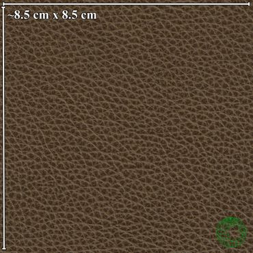 Close-up of textured brown leather surface with measurement scale.