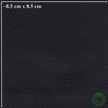 Close-up of black leather texture with 8.5 cm scale reference.