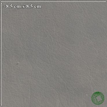Close-up of a grey textured leather surface with measurement scale.