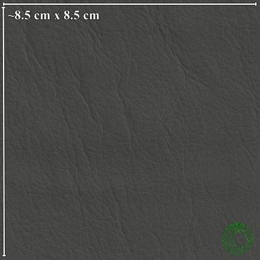 Close-up of dark gray leather texture with fine wrinkles.