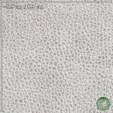 Close-up of textured light gray leather with fine grain patterns.