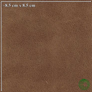 Close-up of brown leather texture with measurement scale.